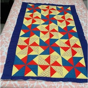 Quilt Muliticolor 62x44 unfinished trim  see photos for small stains